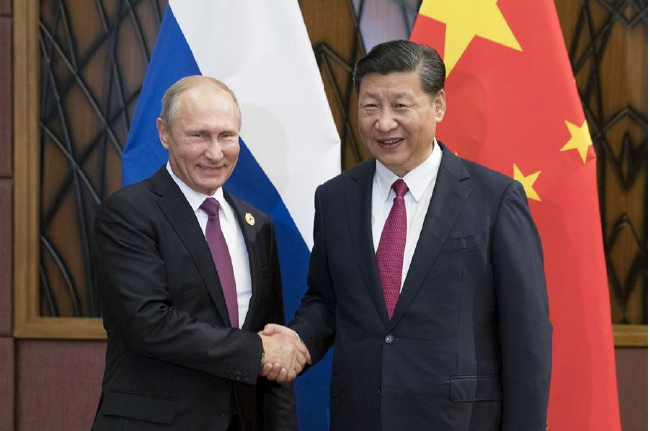 Xi, Putin Pledge to  Enhance Regional, Int’l Cooperation 